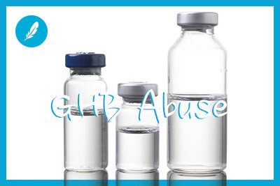 three vials with liquid in them on a white background
