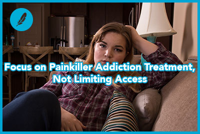 girl sitting on couch looking at camera